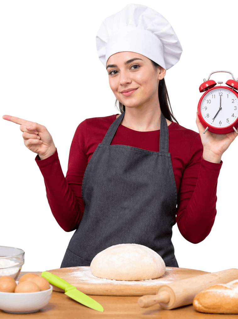 Chef with alarm clock in modern kitchen with bread and baking tools – kitchenReviews