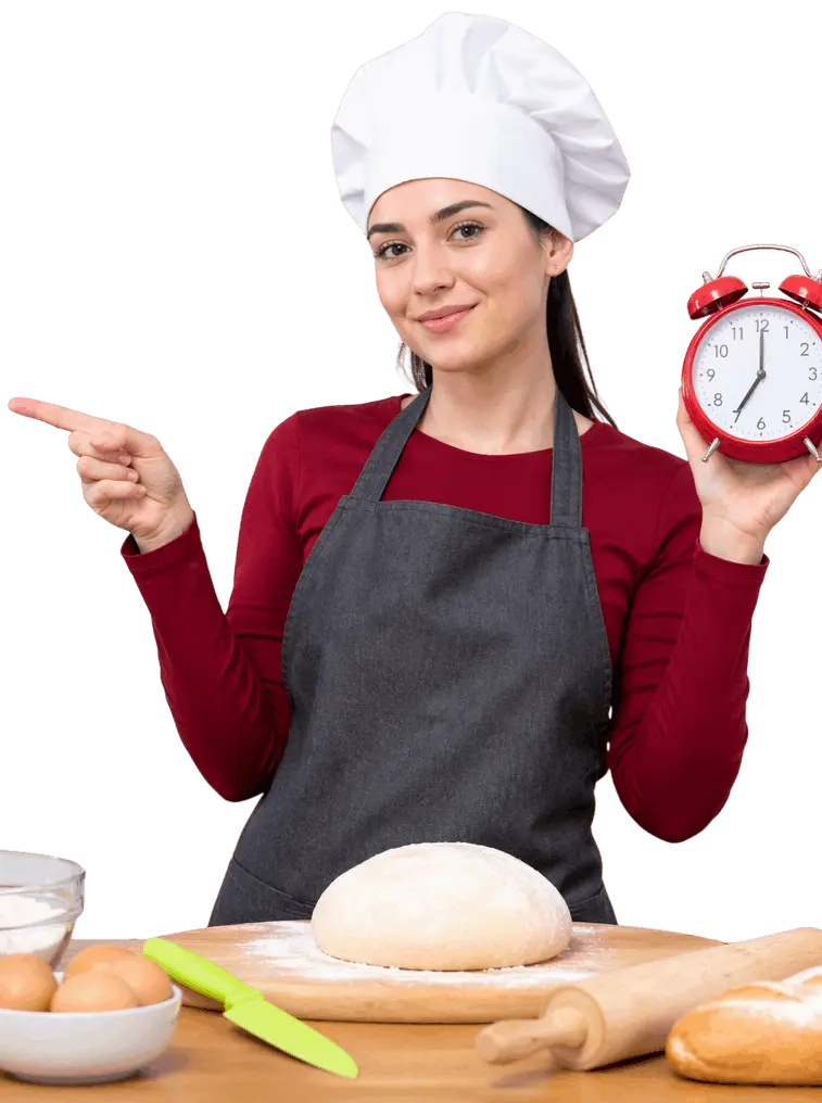 Chef with alarm clock in modern kitchen with bread and baking tools kitchenReviews